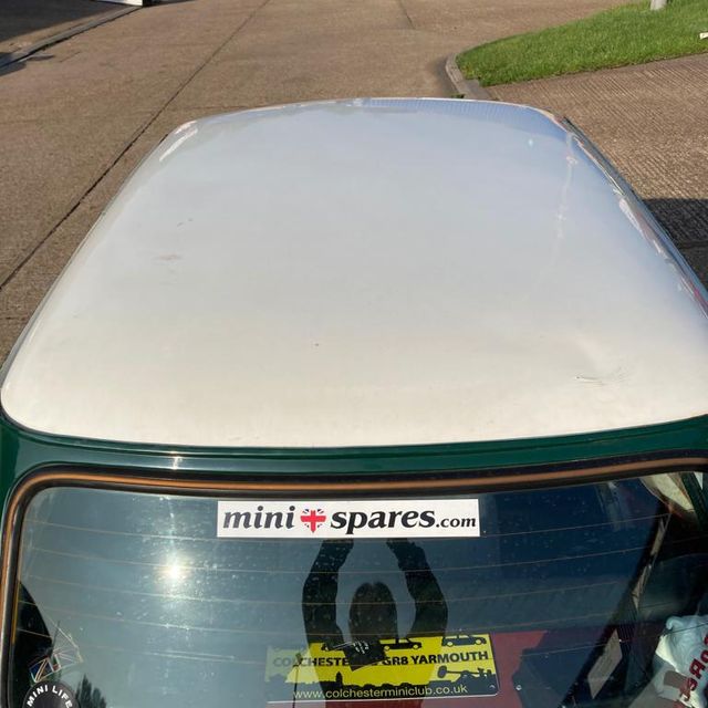 Before - Classic mini white roof damage 